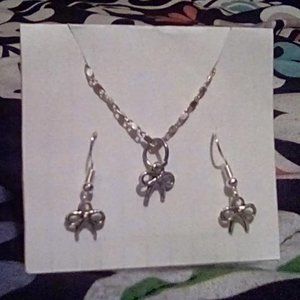 4/ $10 Silver tone set "Bows" Pin up girl vibe